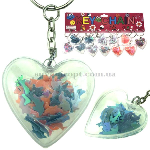 Брелок сердце прозрачное с присыпкой дельфины (12)