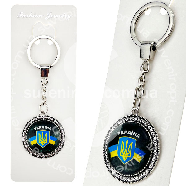 Брелок в упаковці герб Украіни з лентою темний фон скло (12)