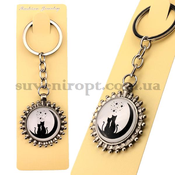 Брелок металлический  в упаковке стекло коты на месяце (12)