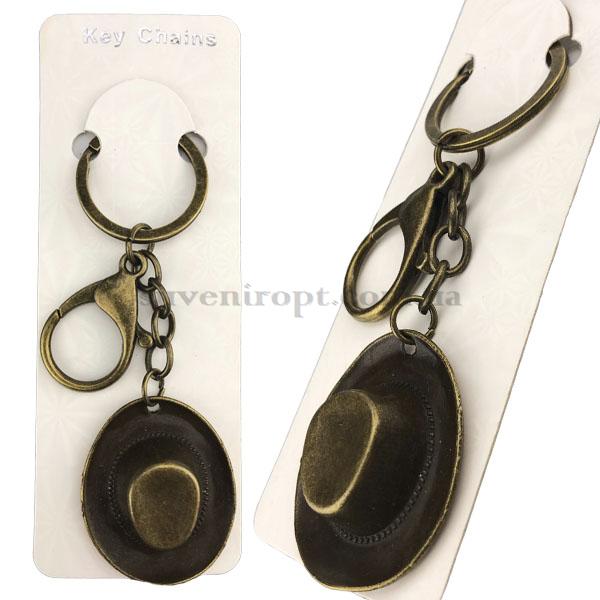 Брелок в упаковке шляпа ковбойская  металлическая (12)