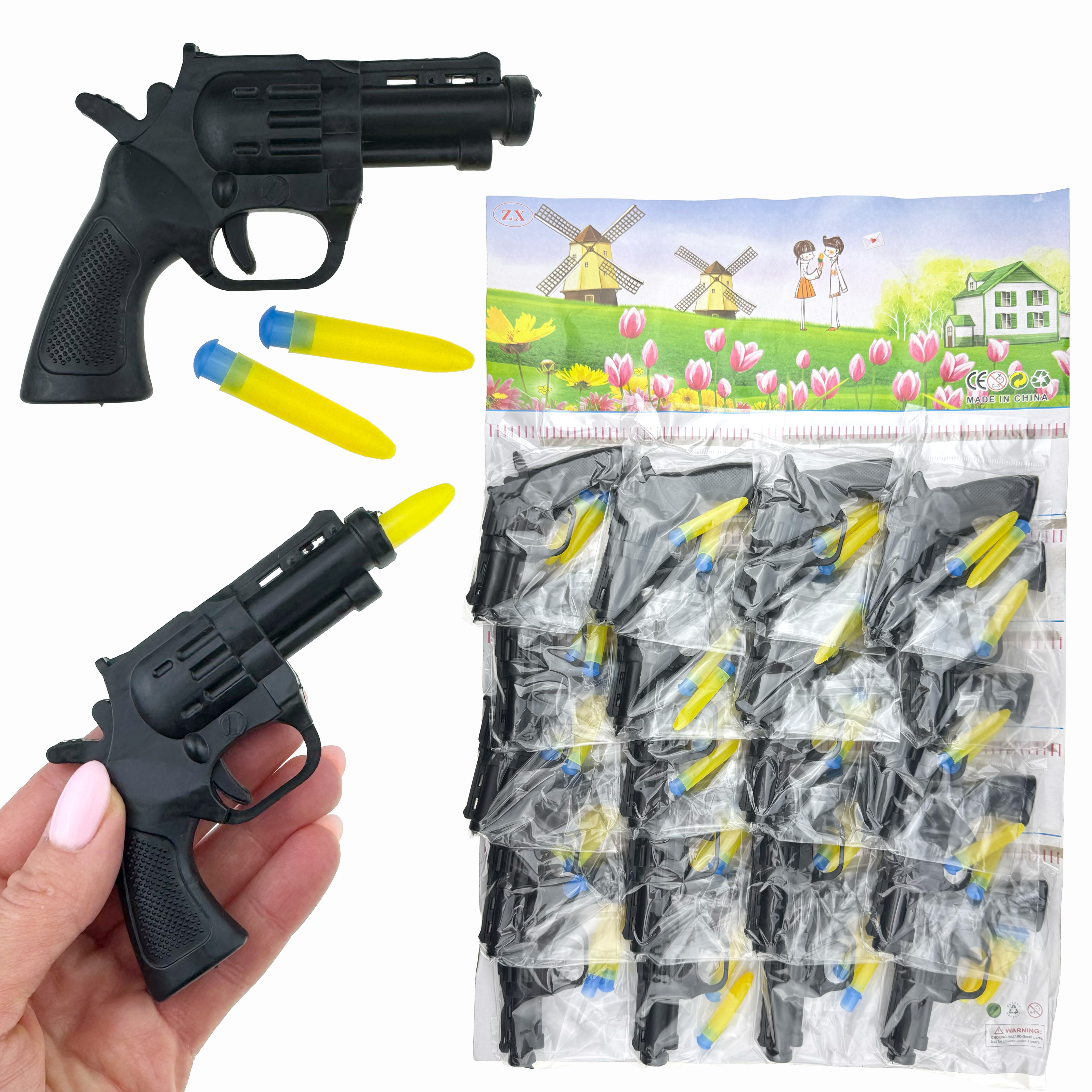 Револьвер стріляє жовтими кулями на планшетці (20) /2000/