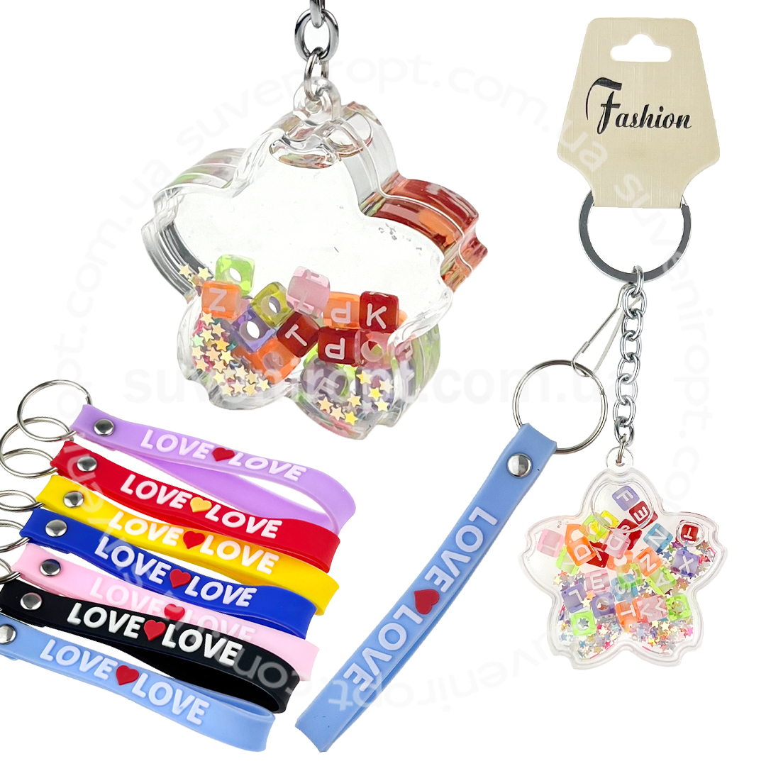 Брелок в упаковці зірочка з бісером в воді та гумовий лацюг (12)