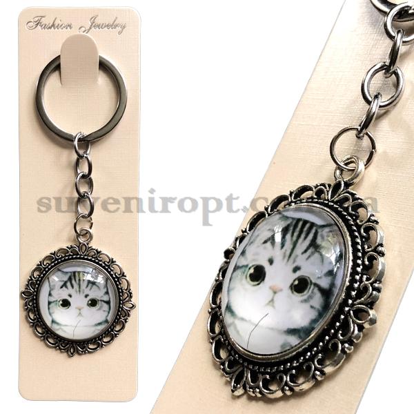 Брелок металлический  в упаковке стекло котик серенький  (12)