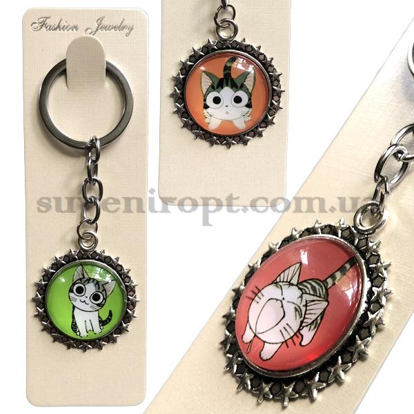 Брелок металлический  в упаковке стекло коты в звёздочках  (12)