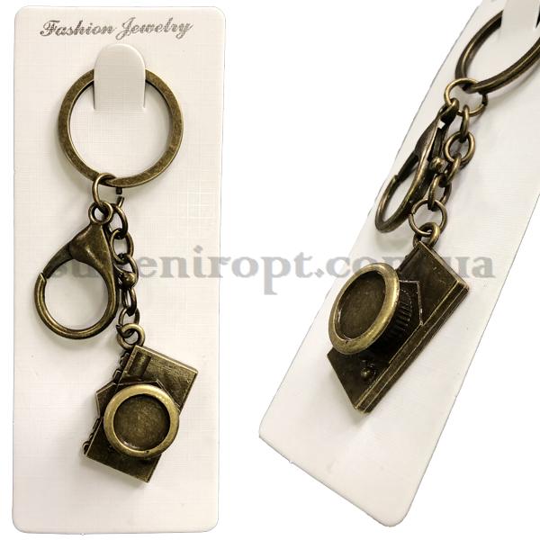 Брелок   в упаковке металлический фотоаппарат