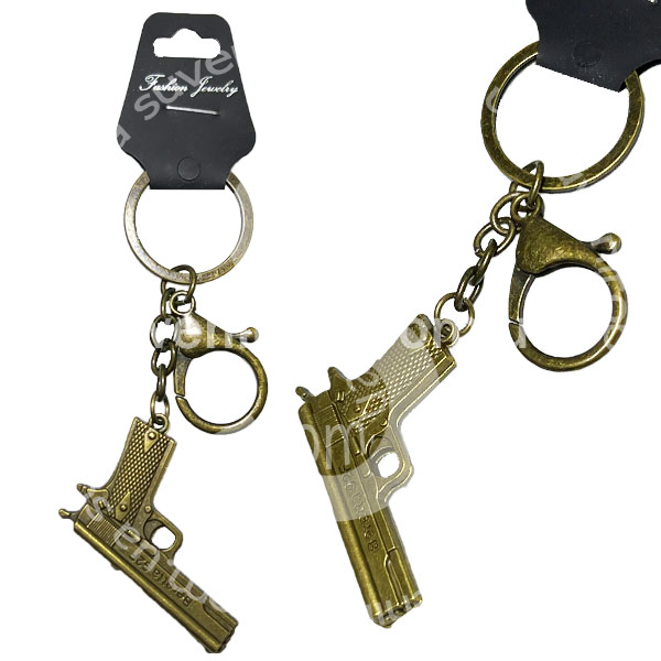 Брелок в упаковці металевий пістолет Беретта товстий з камінчиком (12)