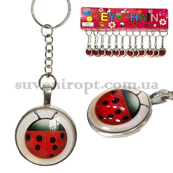 Брелок  металлический стекло божья коровка (12)
