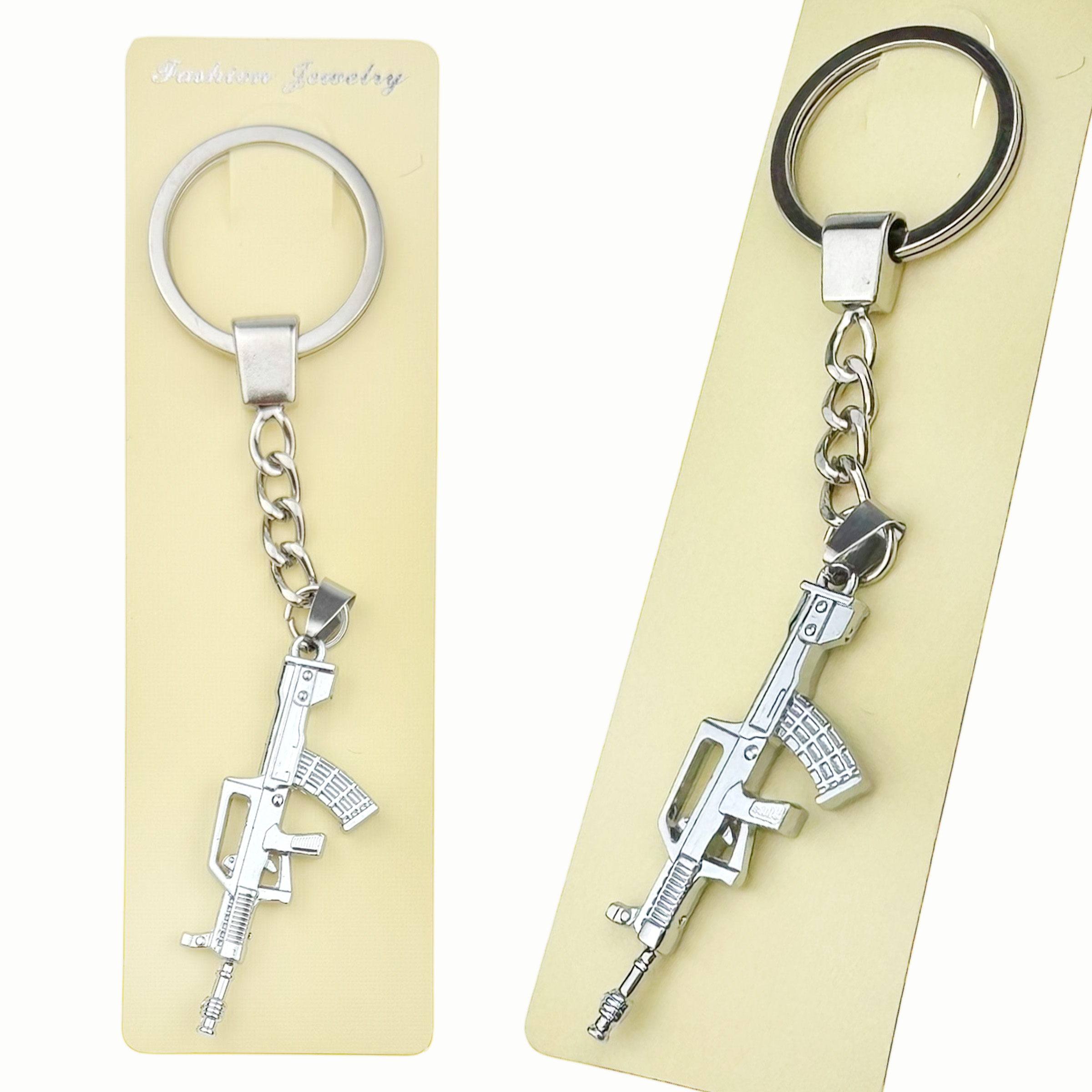 Брелок в упаковці  металевий автомат білий (12)