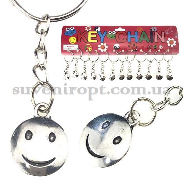 Брелок металевий смайлик маленький круглий (12)