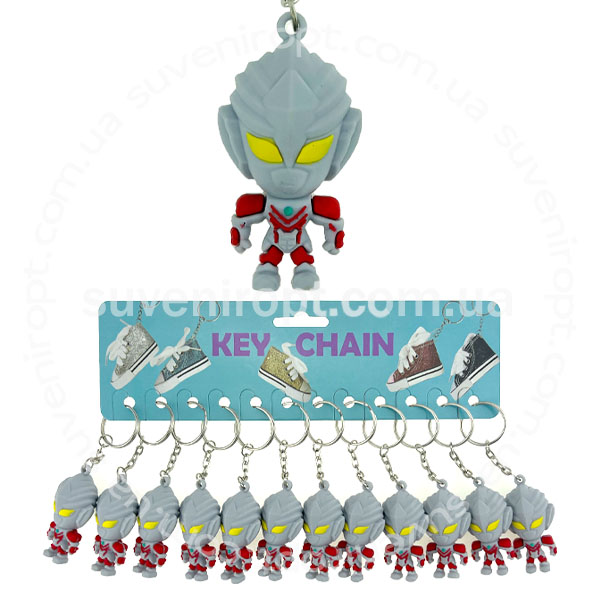 Брелок гумовий трансформер сірий з червоним обємний (12)