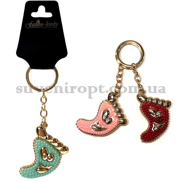 Брелок   в упаковке  стопа смайл  в бисере (12)