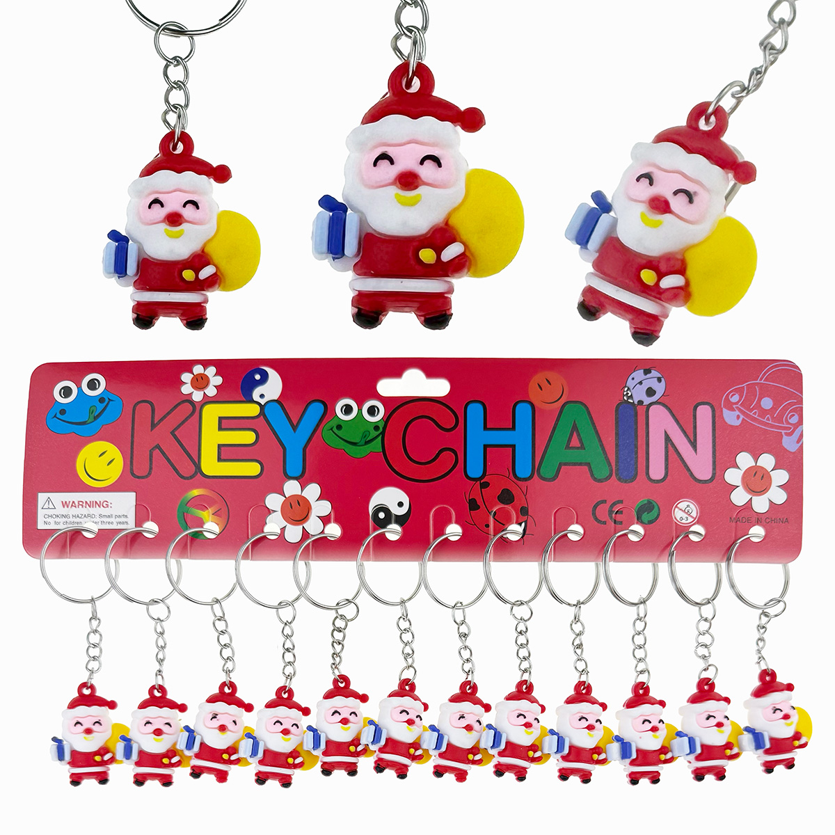 Брелок гумовий обʼємний Дід Мороз з подарунком малий (12)
