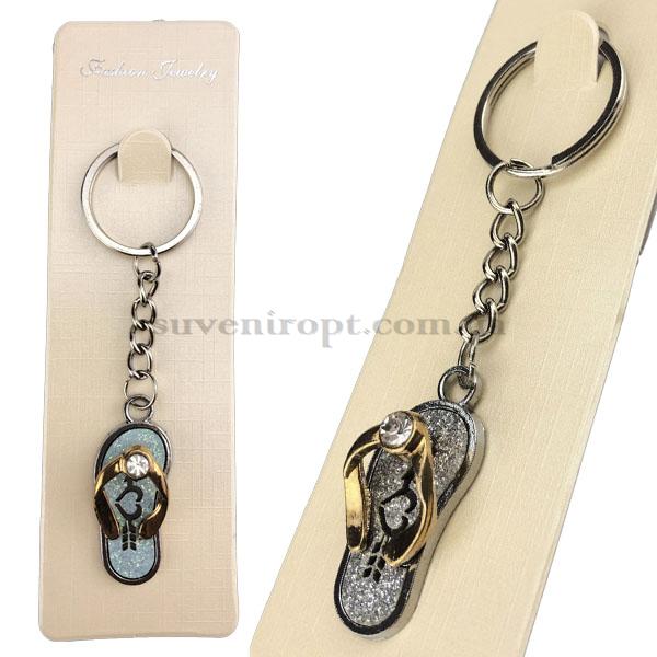 Брелок в упаковке шлёпанец  с камнем металлический (12)