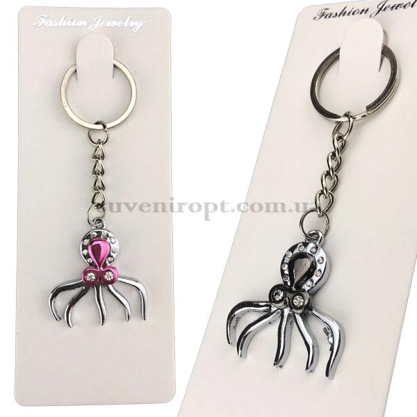 Брелок в упаковке осминог  с камнем металлический (12)