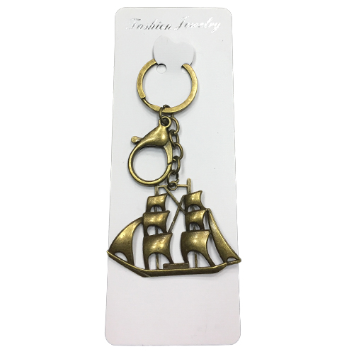 Брелок в упаковке корабль металлический золотой (12)